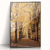 Mid-century modernist art depicting a fall landscape in orange and brown tones, framed in silver acrylic.