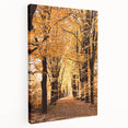 Side view of a large stretched canvas depicting a fall landscape with warm orange and brown tones.