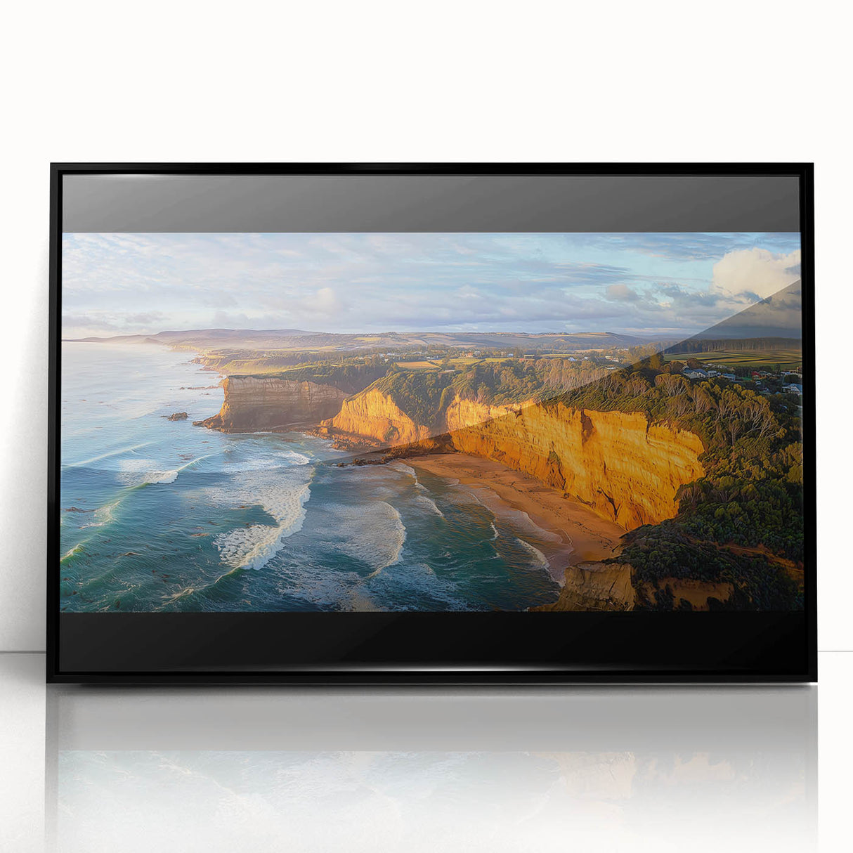 Framed acrylic artwork showcasing a breathtaking landscape of cliffs, featuring vibrant colors and intricate details, presented in a sleek black frame for modern decor.