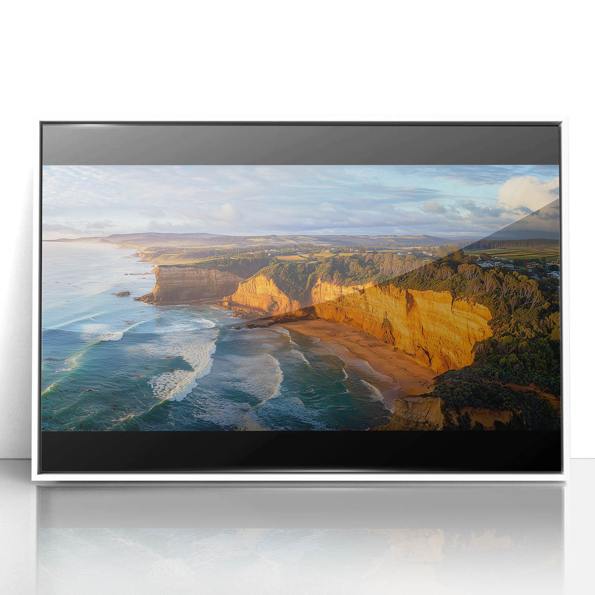 Framed acrylic landscape artwork showcasing dramatic cliffs and serene ocean views in a sleek white frame, ideal for modern home decor. Perfect for nature enthusiasts.