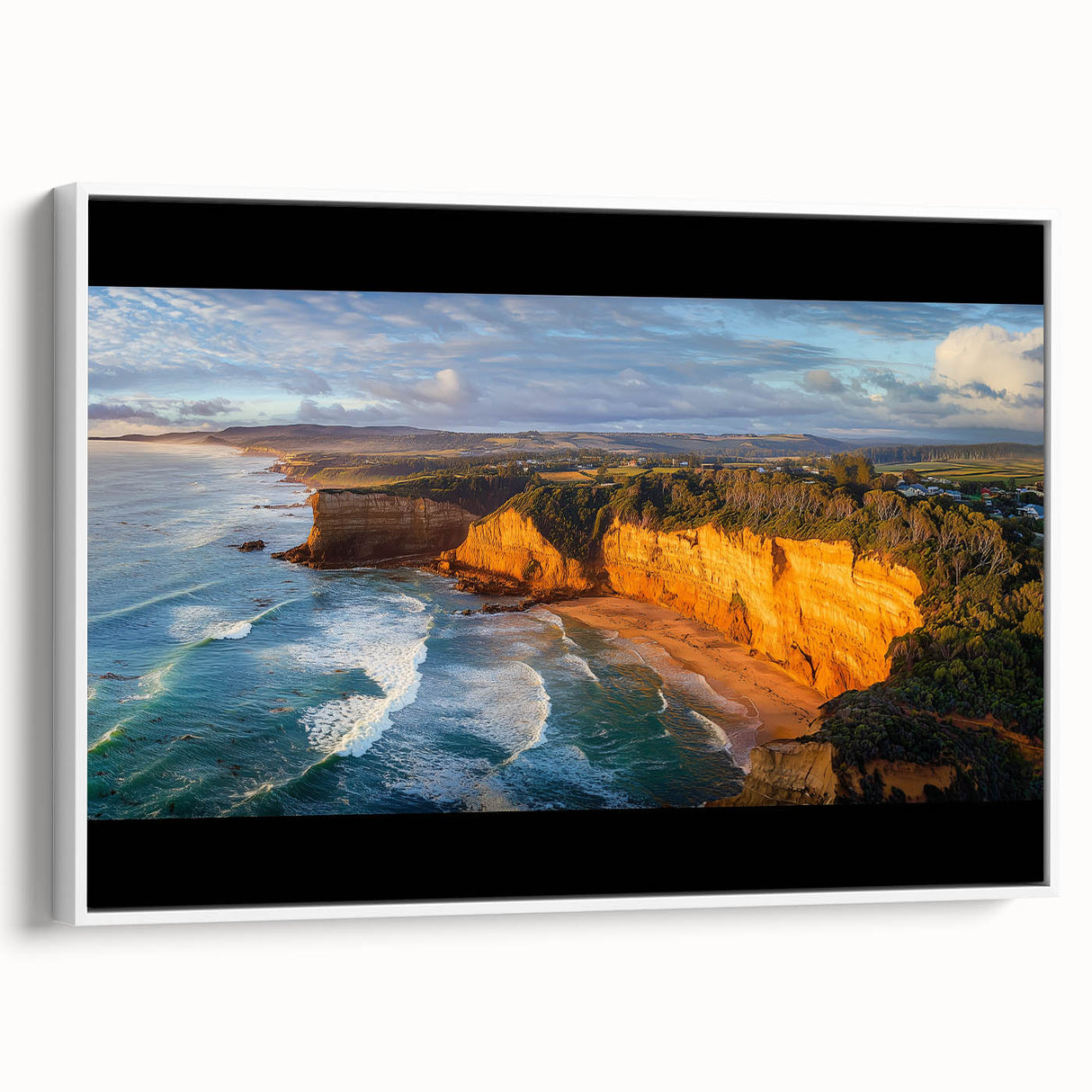 Framed canvas artwork depicting majestic cliffs and serene landscapes, showcasing vibrant colors and details, perfect for home decor in a contemporary setting.