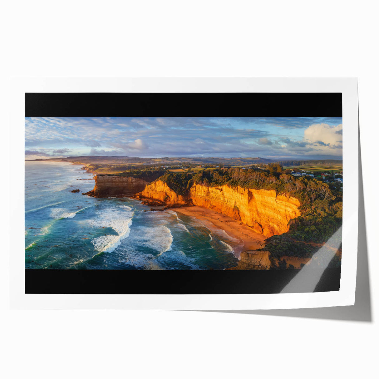 Vibrant rolled print showcasing a stunning landscape of rugged cliffs under a clear blue sky, beautifully packaged in a durable cardboard tube for safe storage and shipping.