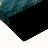 Close-up of a stretched canvas showcasing an abstract landscape with vibrant cliffs and intricate textures, perfect for modern home decor accents.