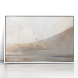 Framed abstract landscape wall art featuring soft hues of blue and white, set against a sleek acrylic background, perfect for modern home decor.
