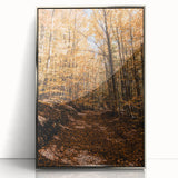 Mid-century modernist art depicting an autumnal scene in vibrant orange and brown tones, framed in silver acrylic.