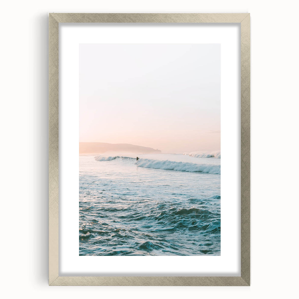 Textured abstract art print in warm orange and yellow hues on a silver-framed canvas, suitable for bedroom decor.