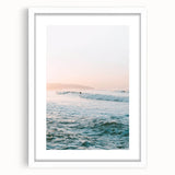 Abstract art print featuring vibrant orange and yellow tones on a white framed canvas, ideal for dining room decor.