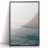 Large abstract wall art featuring vibrant orange and red tones on a black acrylic frame, ideal for modern living room decor.