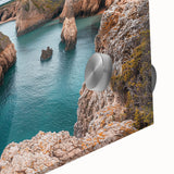 Close-up view of a vibrant acrylic landscape painting depicting dramatic cliffs against a blue sky, showcasing intricate details and rich colors, ideal for home décor.