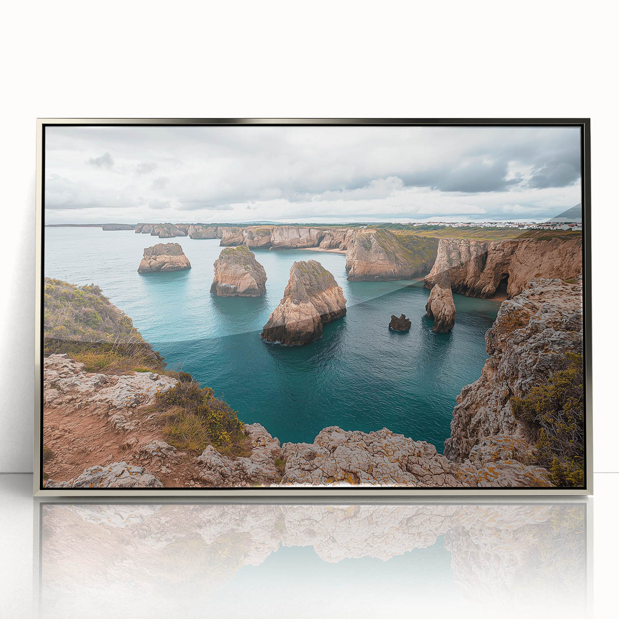 Framed acrylic artwork showcasing a stunning landscape with dramatic cliffs, highlighted by silver accents, perfect for modern home decor and nature enthusiasts.