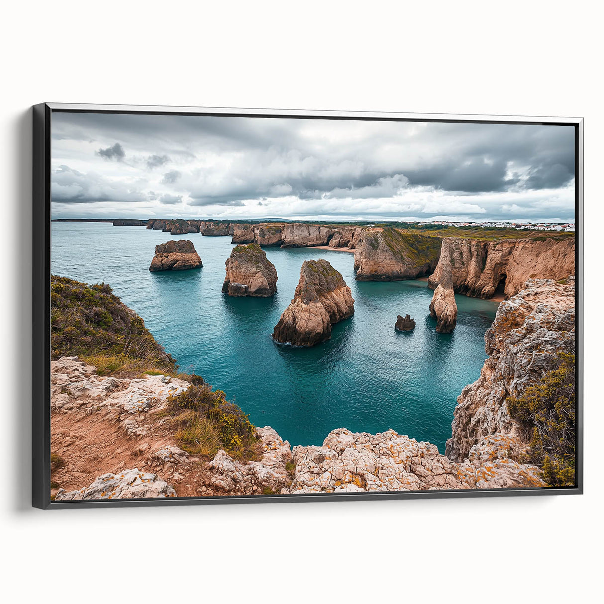 Framed canvas artwork depicting stunning cliffs and landscapes in vibrant colors, showcasing a black side view that enhances its modern aesthetic and design appeal.