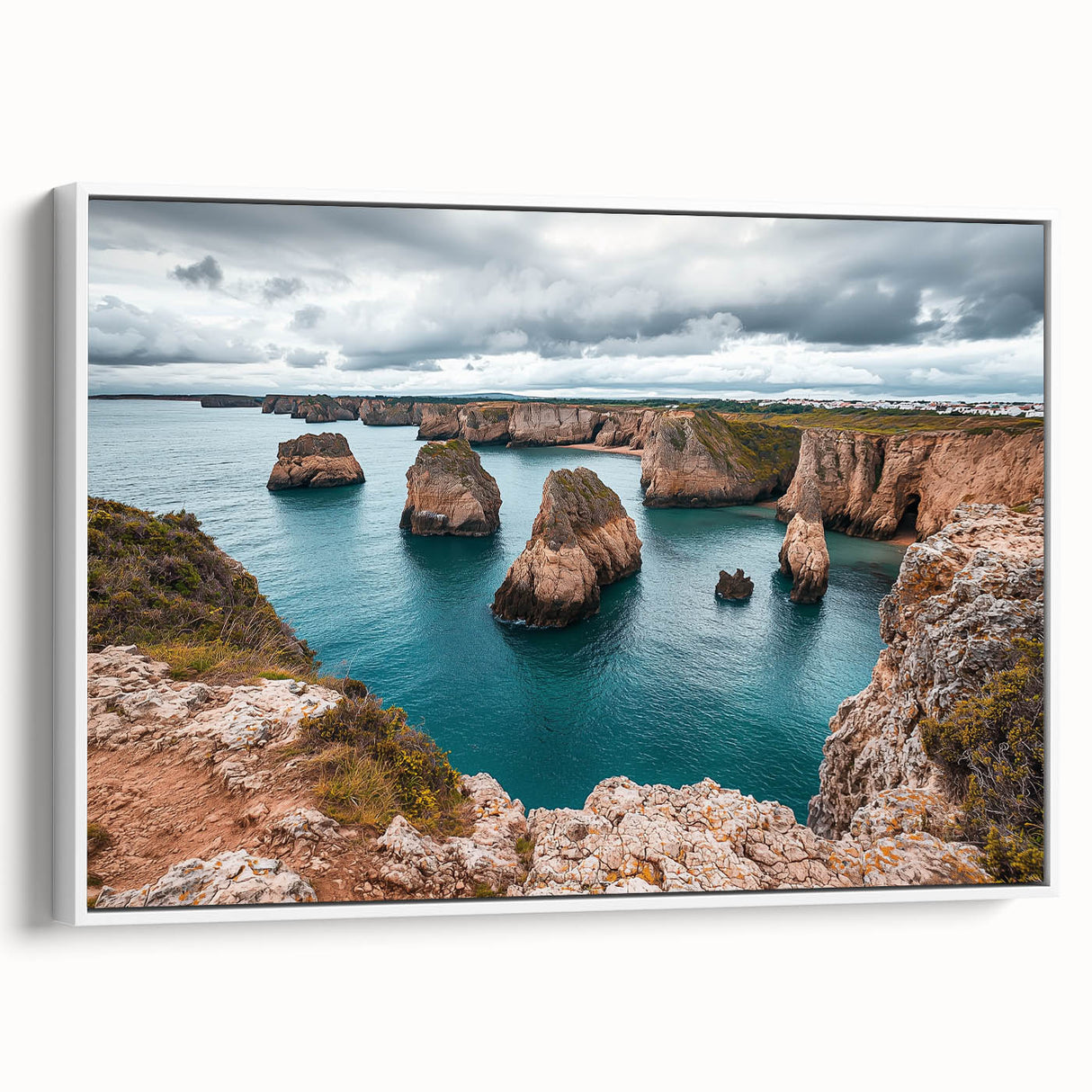 Framed canvas artwork depicting a breathtaking landscape of cliffs, showcasing vibrant colors and intricate details, displayed from a side view against a white backdrop. Perfect for home decor enthusiasts seeking nature-inspired designs.