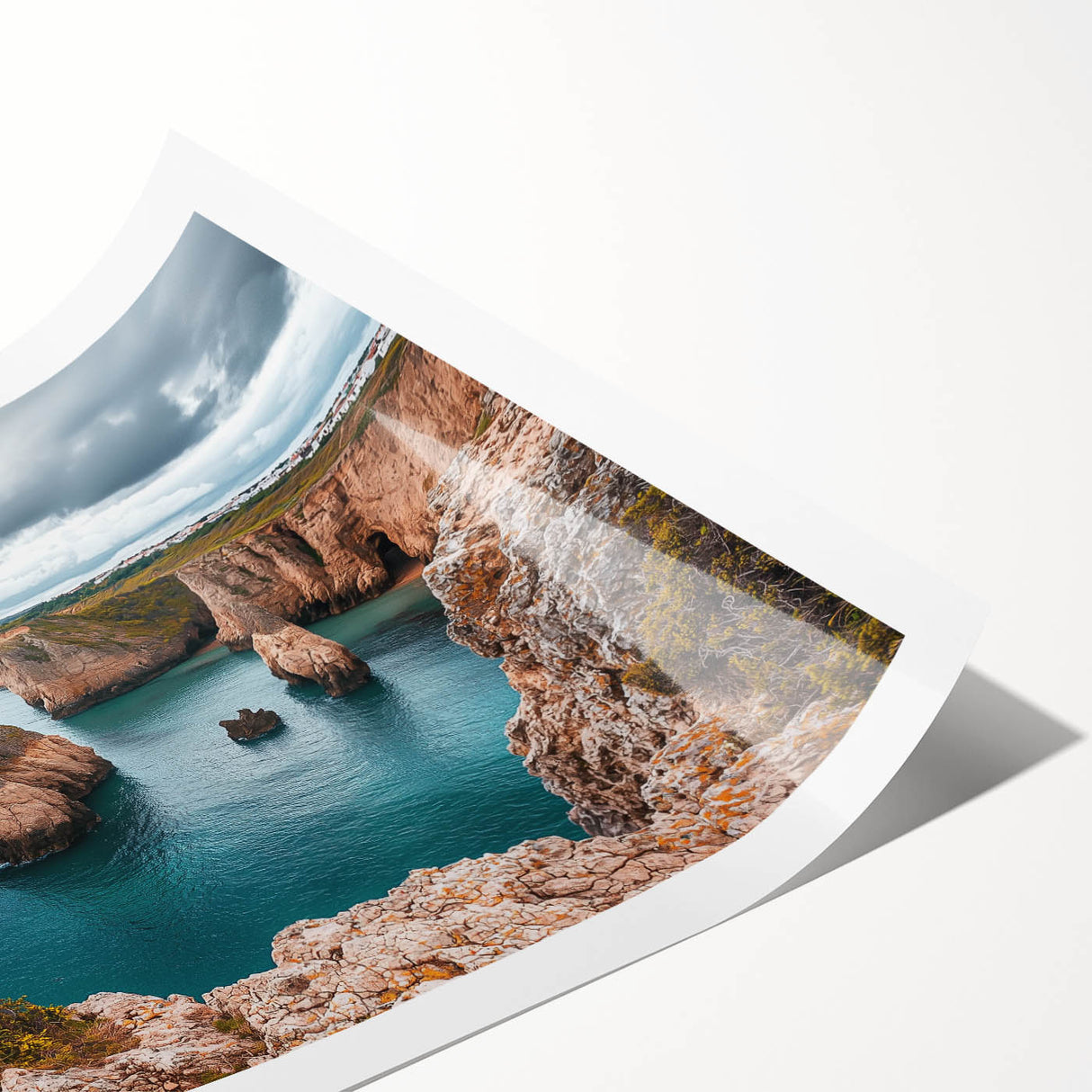 Stunning rolled print of a dramatic cliffside landscape showcasing vibrant colors and intricate details, packaged securely in a durable cardboard tube for easy transport.