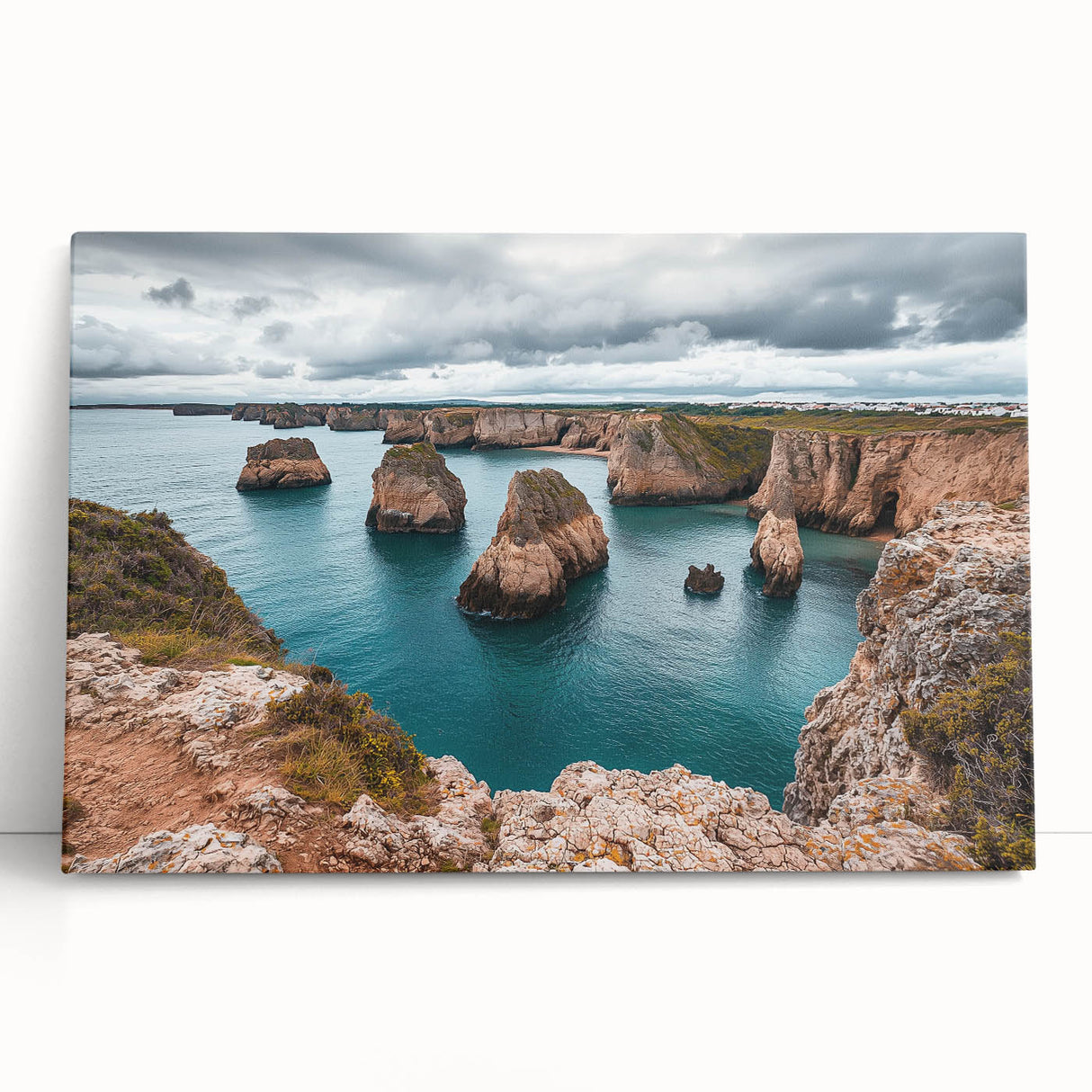 Stretched canvas artwork depicting a dramatic cliff landscape, showcasing vibrant colors and intricate details, perfect for enhancing home decor with nature's beauty.