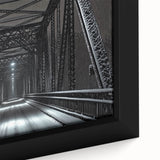 Close-up of a framed canvas artwork depicting a vibrant landscape bridge scene, showcasing lush greenery and a serene waterway, perfect for home decor.