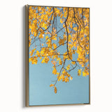 Framed canvas depicting a vintage-style landscape with autumnal trees in gold and black tones, ideal for bedroom decor.