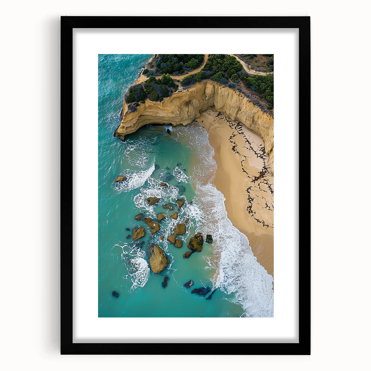 Framed landscape artwork showcasing dramatic cliffs against a serene sky, featuring a sleek black mat and frame, perfect for modern home decor.