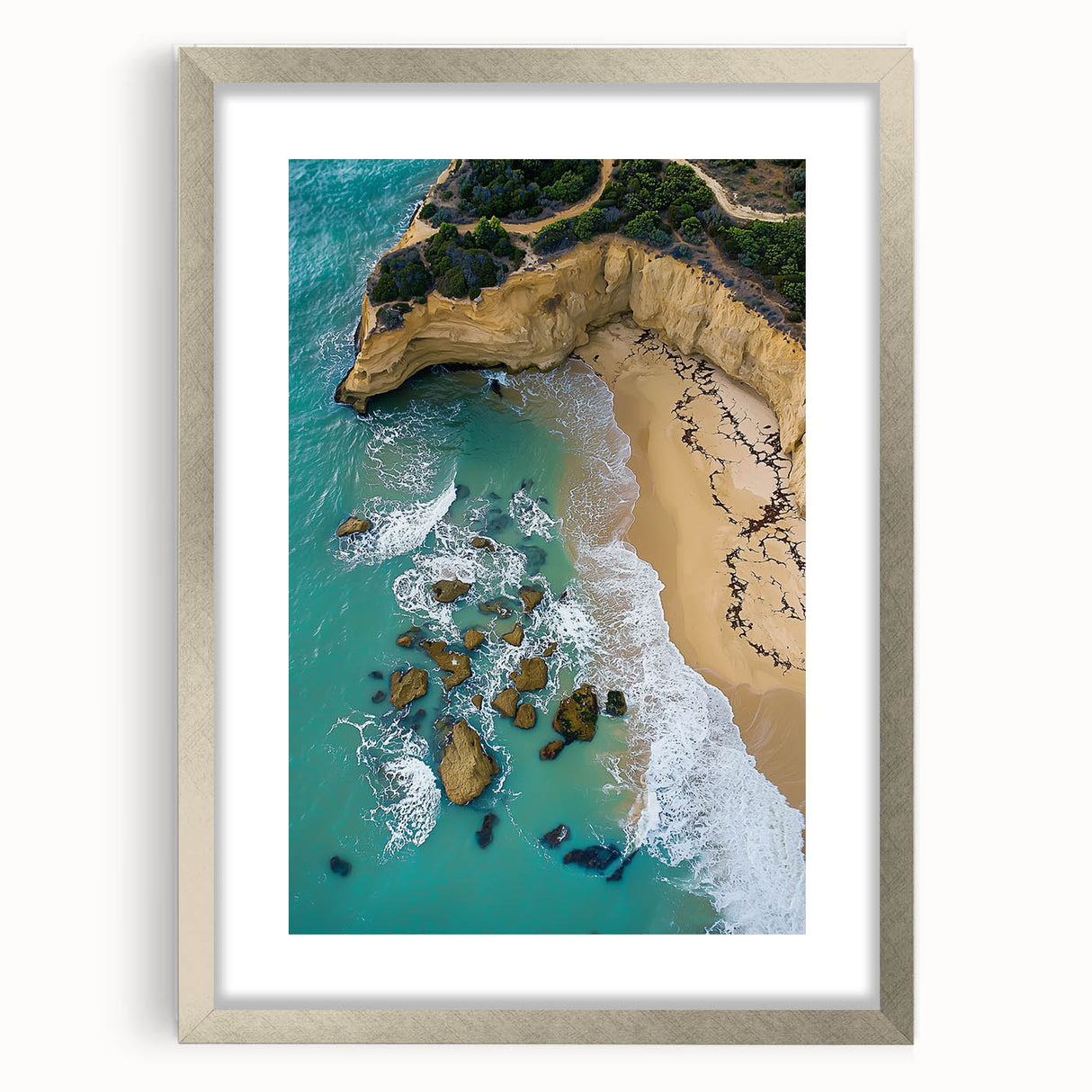 Framed landscape artwork featuring a majestic cliff scene with a silver mat, ideal for modern home decor. This front view highlights the intricate details and vibrant colors, perfect for enhancing any living space.