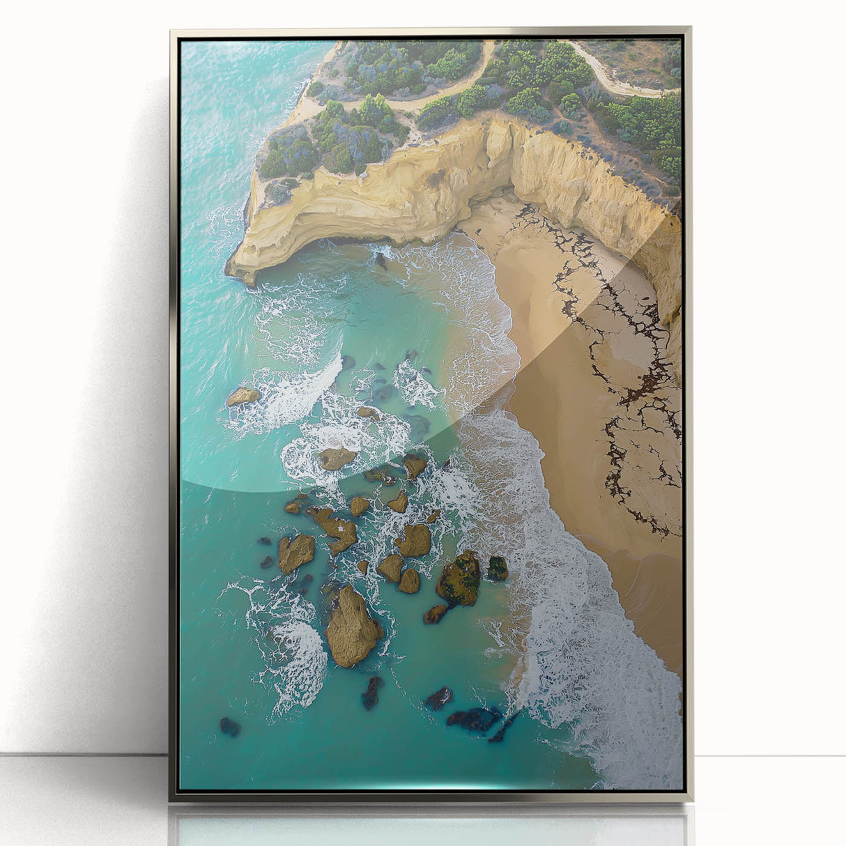 Framed acrylic artwork depicting a stunning landscape of rugged cliffs with vibrant colors, perfect for modern home decor. The artwork features a sleek silver frame that enhances its visual appeal, making it an ideal centerpiece for any room.