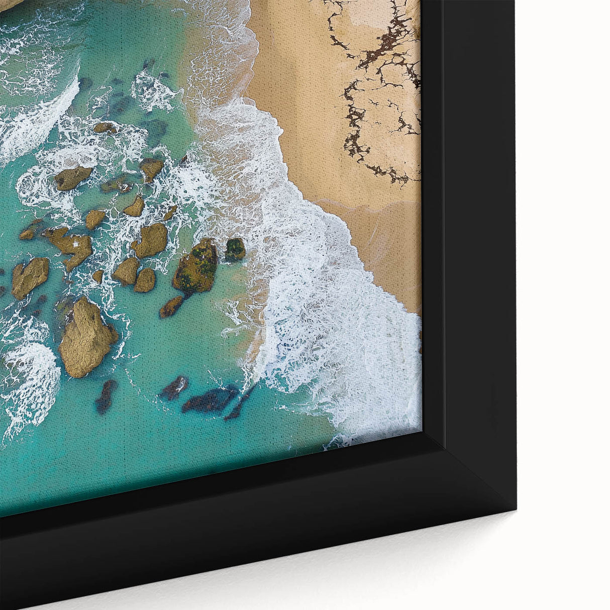 Close-up of a framed canvas print showcasing vibrant landscapes with dramatic cliffs and rich textures, perfect for enhancing modern home decor.
