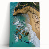 Stretched canvas artwork depicting vibrant cliff landscapes in rich earthy tones, leaning against a neutral wall, perfect for modern home decor.