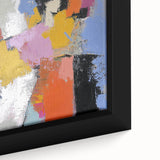 Close-up view of an abstract figurative framed canvas artwork displaying vibrant colors and intricate textures, perfect for modern home decor or art enthusiasts.