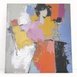 Abstract figurative stretched canvas artwork featuring a vibrant color palette with dynamic shapes, leaning against a neutral wall for artistic display.