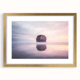 Elegant gold-framed landscape artwork featuring dramatic cliffs and serene ocean waves, perfect for enhancing any home decor. The mat adds depth and sophistication.