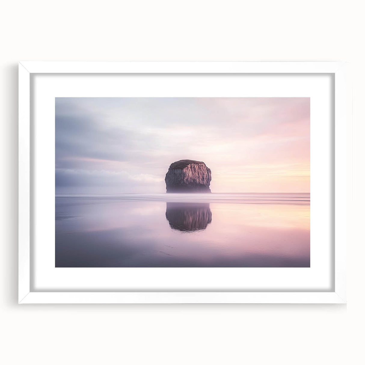 Framed landscape artwork showcasing dramatic cliffs and serene nature, presented with a white mat for an elegant touch, ideal for home decor.