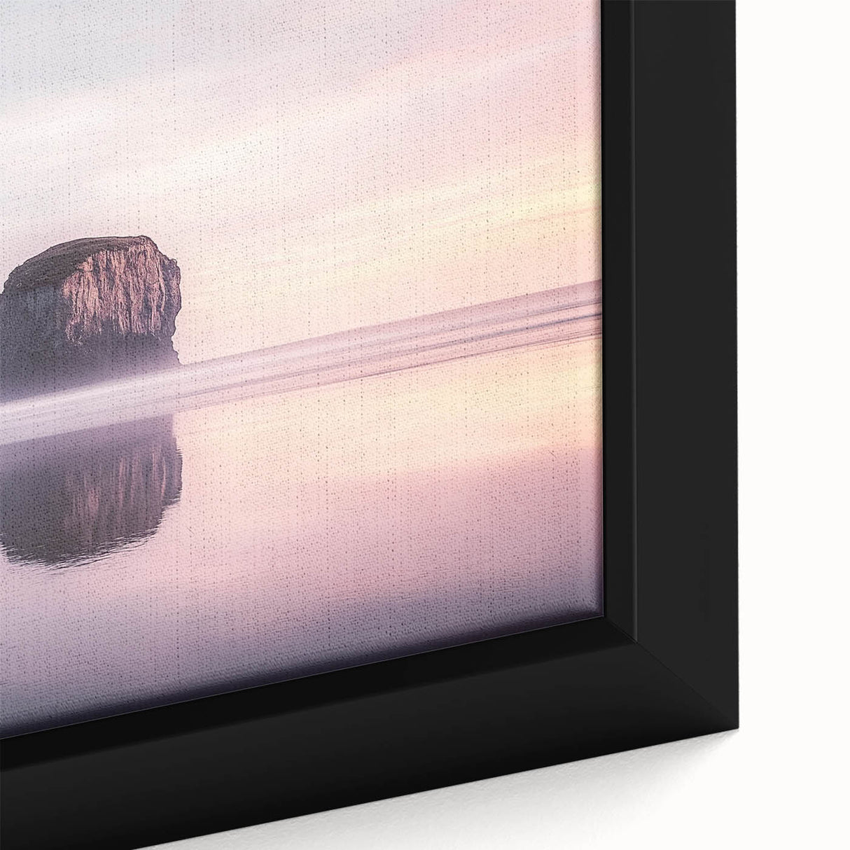 Close-up of a framed canvas artwork depicting dramatic cliffs and landscapes with vibrant colors, perfect for enhancing home decor in a stylish setting.