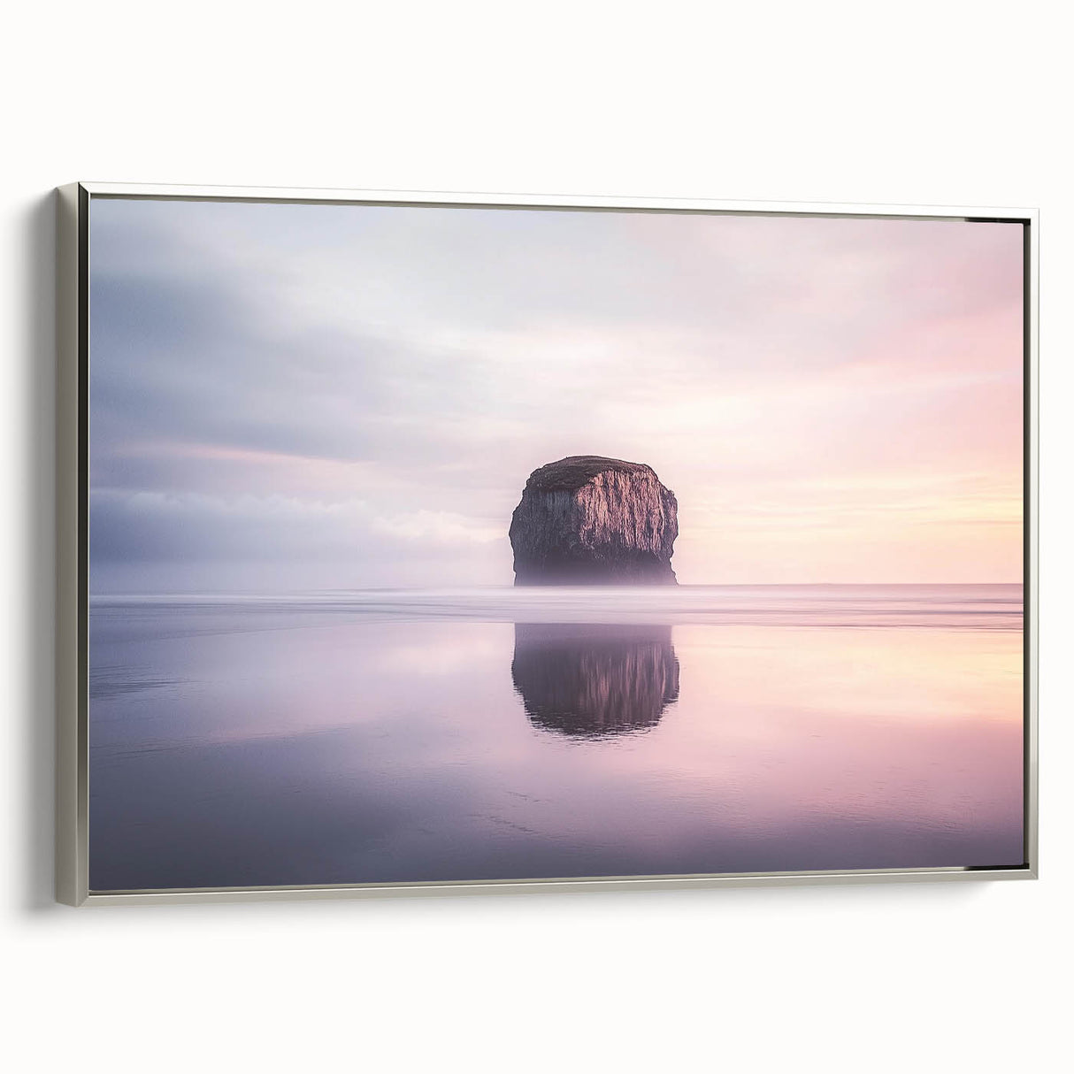 Framed canvas artwork showcasing a stunning landscape of cliffs in soft silver tones, emphasizing depth and texture, perfect for modern home decor.