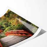 Scenic landscape bridge design printed on rolled canvas, showcasing vibrant colors and intricate details, packaged securely in a protective cardboard tube.