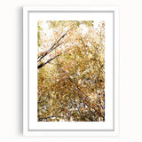 Abstract art print featuring warm autumn colors on a white framed canvas, ideal for dining room or bedroom decor.