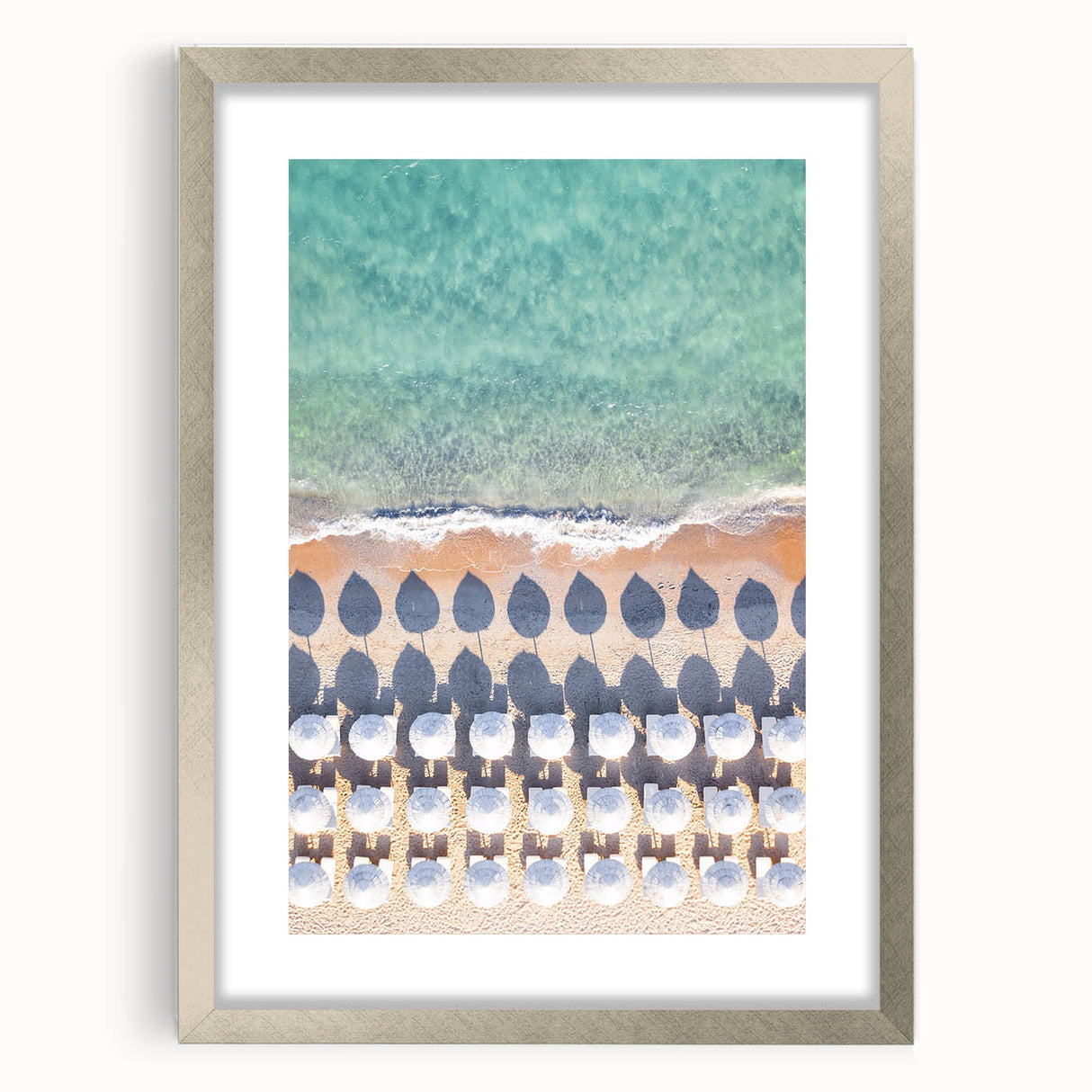 Textured abstract art print in orange and yellow hues, framed in silver, ideal for bedroom wall decor.