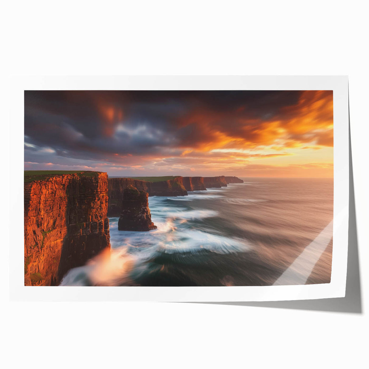 Vibrant rolled print showcasing a dramatic cliff landscape, featuring rich colors and intricate details, packaged securely in a protective cardboard tube for shipping.