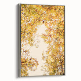 Framed canvas depicting a vintage-style landscape art painting with colorful autumn trees against a black background.
