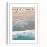 Abstract art print featuring swirling blue and green patterns on a white framed canvas.