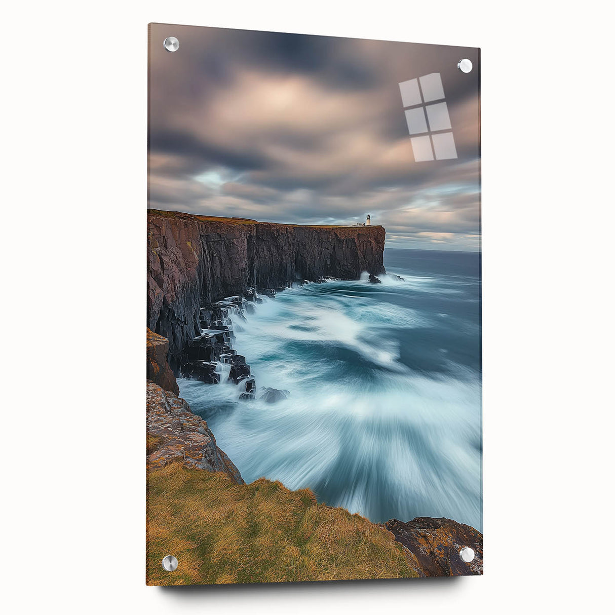 Acrylic wall art showcasing a vibrant landscape with dramatic cliffs, displayed from a side view, secured with decorative pins for a contemporary finish.