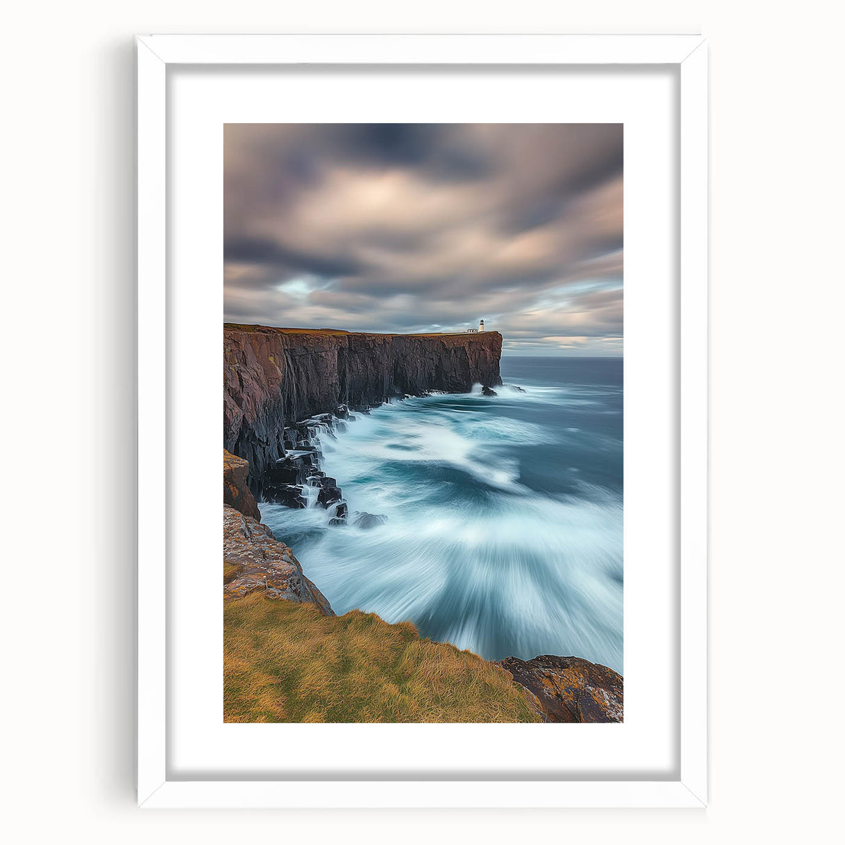Framed landscape art print showcasing dramatic cliffs and serene skies, featuring a white mat for an elegant finish, ideal for home décor or office settings.