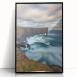 Framed acrylic artwork showcasing a dramatic cliff landscape in vibrant colors, set in a sleek black frame, ideal for enhancing modern decor.
