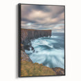 Framed black canvas featuring a stunning landscape of majestic cliffs, showcasing vibrant colors and intricate details, ideal for home decor or art enthusiasts.