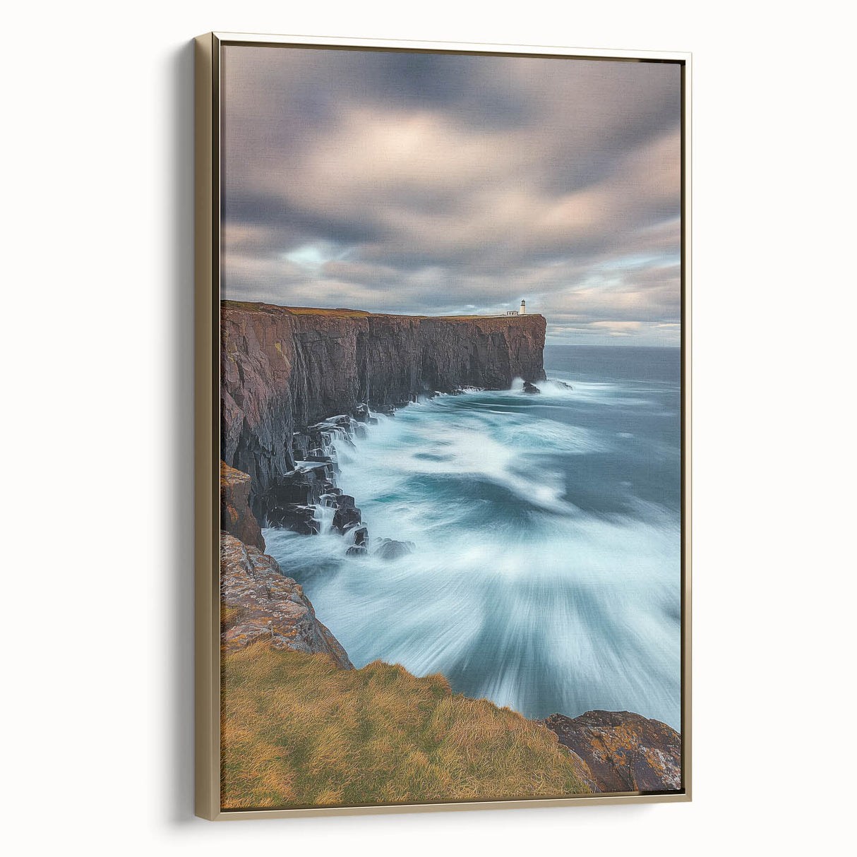 Framed canvas artwork showcasing a dramatic cliff landscape with golden accents, ideal for modern decor. Perfect for enhancing living spaces with nature-inspired elegance.