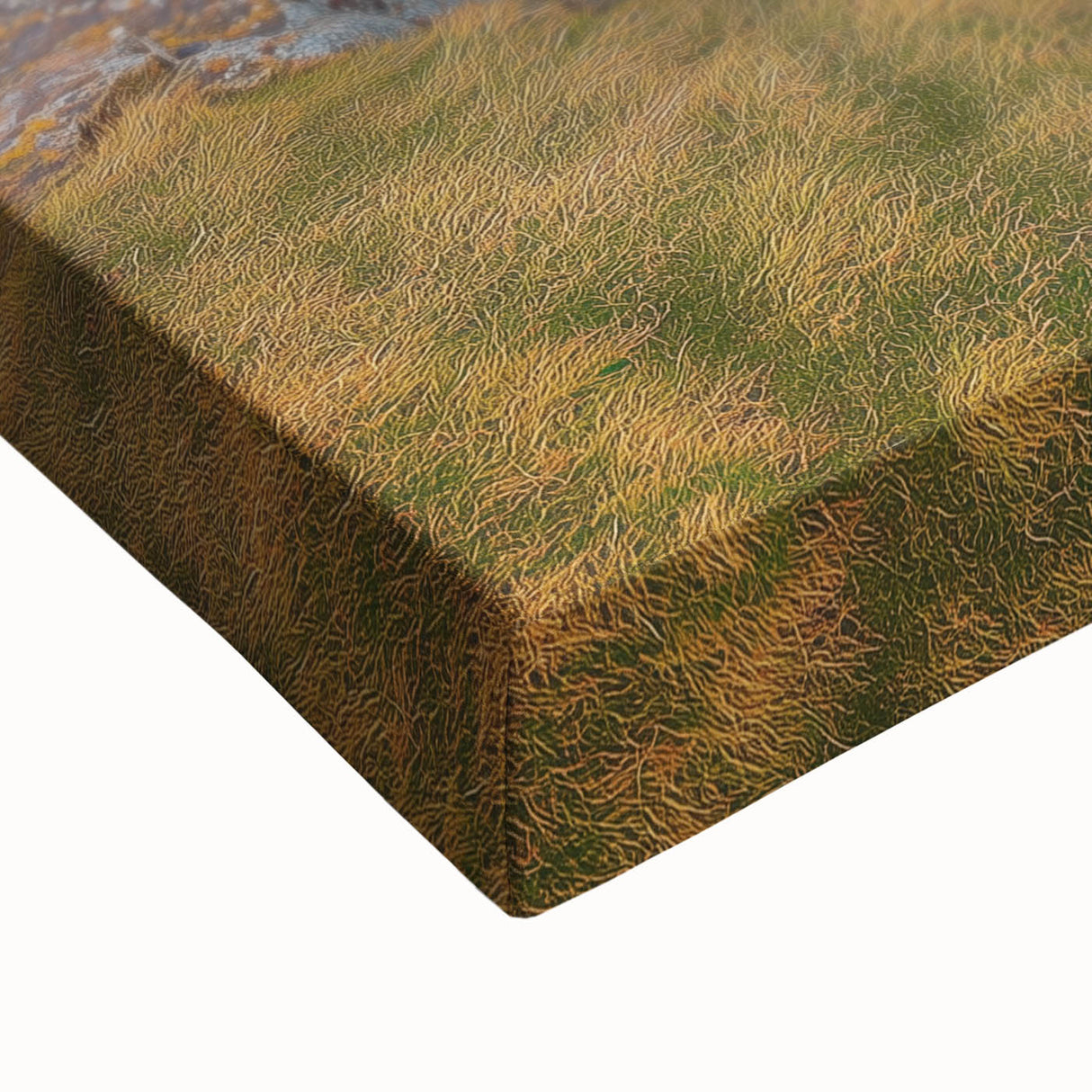 Close-up of a stretched canvas showcasing a vibrant landscape of rugged cliffs and dramatic skies, emphasizing rich colors and intricate textures, perfect for home decor.