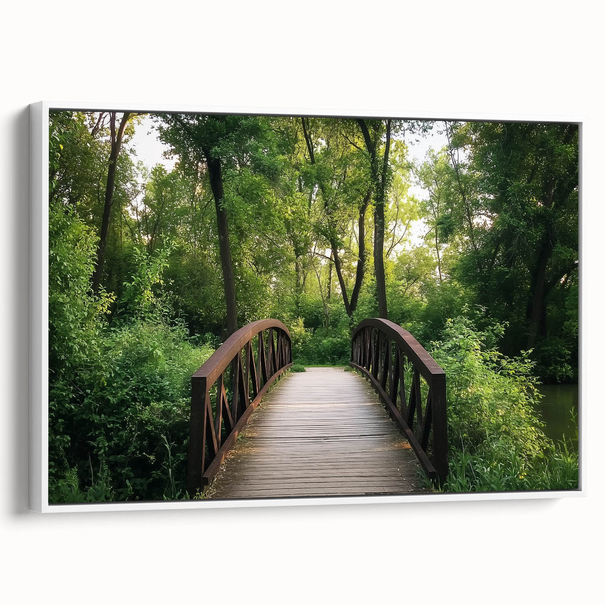 Framed canvas artwork depicting a serene landscape bridge in a white frame, showcasing vibrant colors and detailed scenery, ideal for home decor.