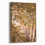 Framed canvas depicting a vintage-style landscape with autumn trees in gold and black tones, suitable for bedroom decor.