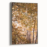 Landscape art painting of autumn trees on a framed canvas, featuring a blend of orange and red tones.