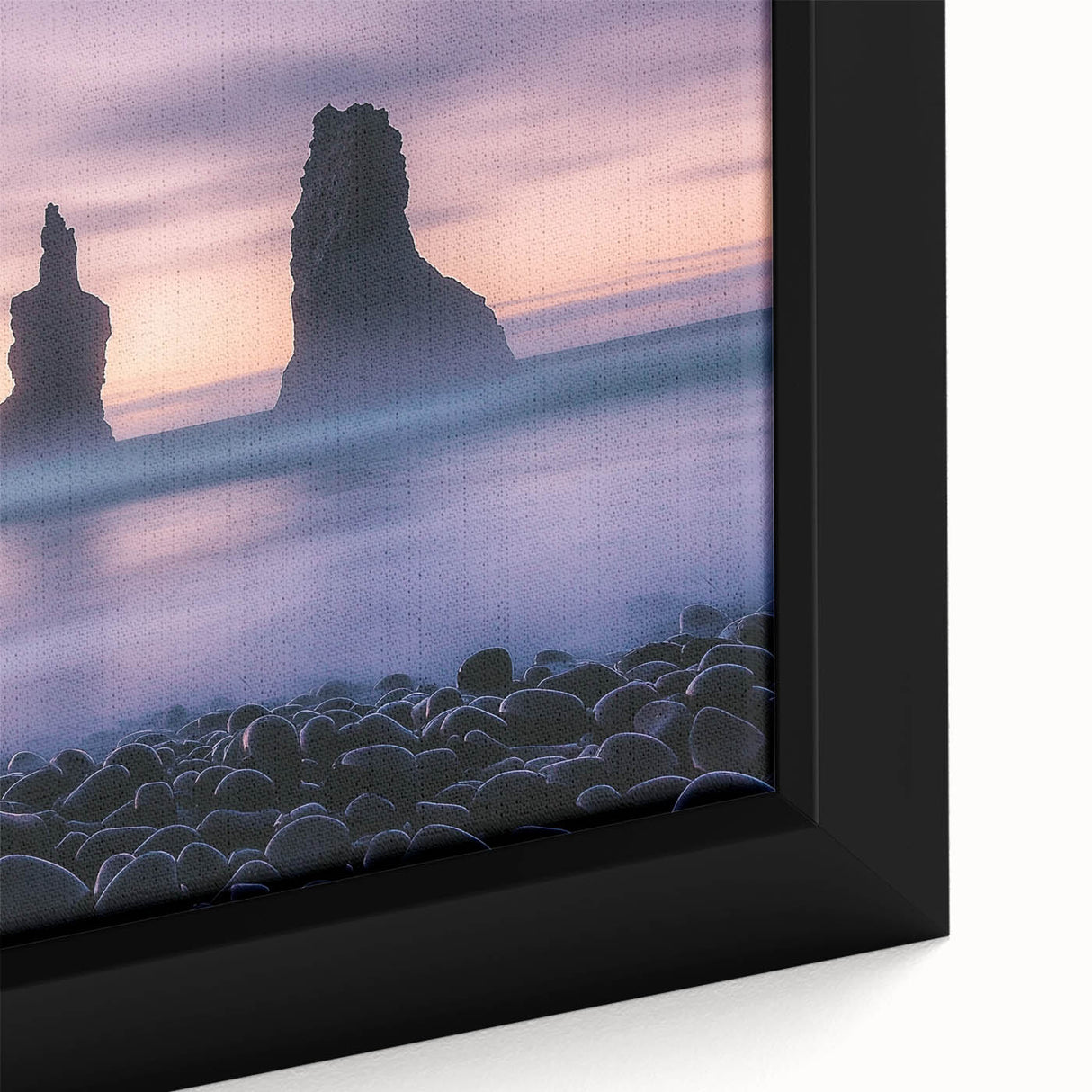 Close-up of a beautiful framed canvas depicting dramatic cliffs and serene landscapes, showcasing vibrant colors and intricate details, perfect for home decor.