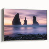 Framed canvas artwork depicting dramatic cliffs and landscapes, showcasing a silver frame. Ideal for enhancing home decor with a modern aesthetic.