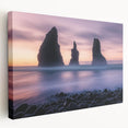 Stretched canvas artwork depicting a breathtaking landscape of dramatic cliffs against a vibrant sky, showcasing rich colors and intricate details for home decor.