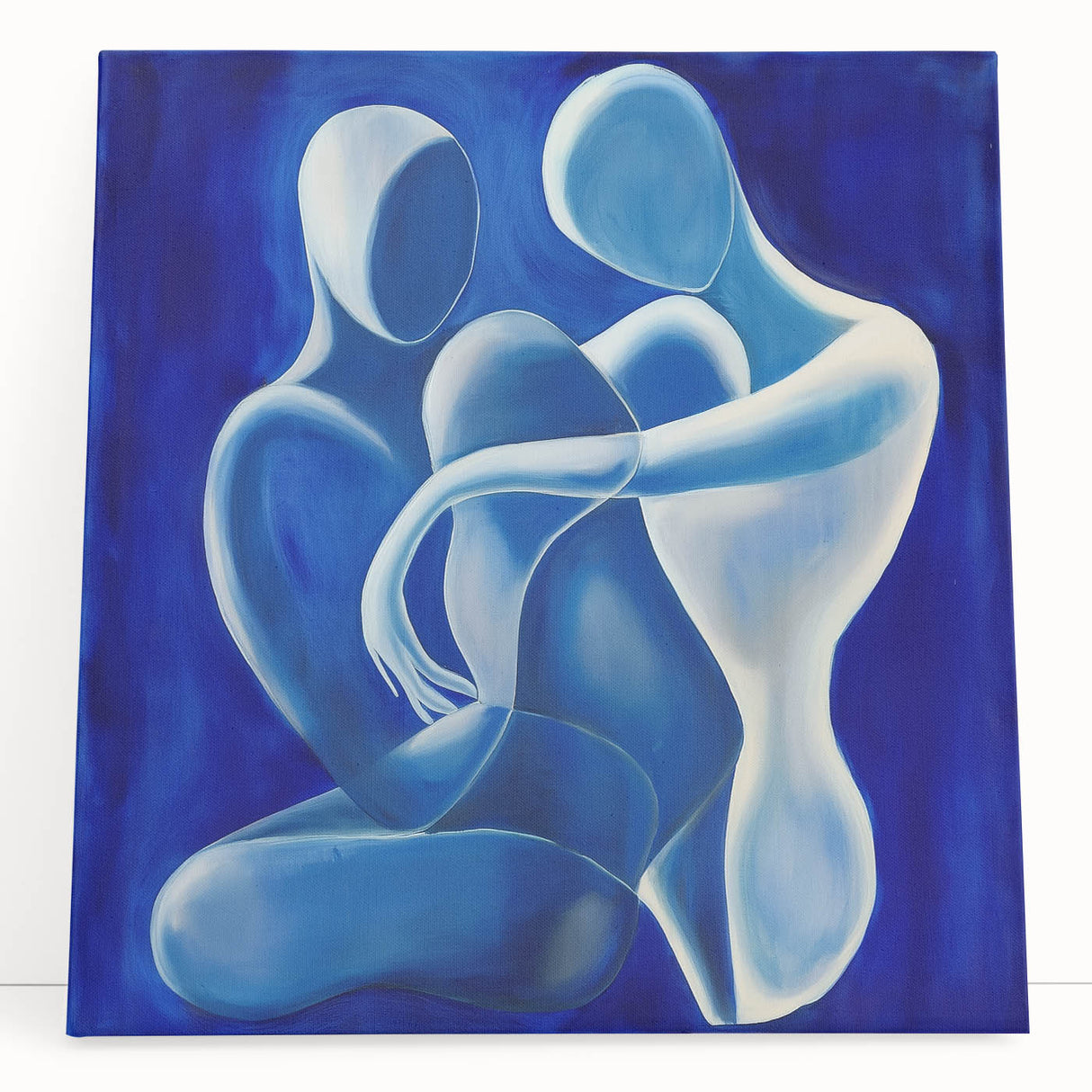 Abstract figurative art on a stretched canvas, showcasing vibrant colors and dynamic shapes, leaning against a neutral wall, perfect for modern home decor.
